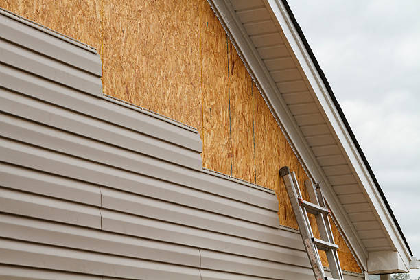 Professional Vinyl Siding technician working in Six Mile, SC